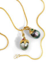 Load image into Gallery viewer, The Spiral Pearl and Acorn charms on a gold chain.