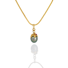 Load image into Gallery viewer, The Acorn Pearl charm on a handwoven chain.