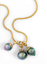 Load image into Gallery viewer, The Crown charm shown with other pearl charms.