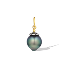 Load image into Gallery viewer, This pearl begged for the coolness of platinum to enhance its color. So a dainty platinum daisy cap sits atop this pear-shaped deep blue green pearl. Grass-green tsavorite garnets alternate on the petals, reflecting the mysterious sea colors. A single, oversize gold granule holds the bail. Length approximately 24mm, width 10.9mm (L .95in W .4in).

Made from recycled 22k gold and platinum, a 10.9x11.9mm cultured Tahitian pearl and Kenyan garnets (.05ct). The chain is available separately.

One-of-a-kind.
