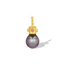 Load image into Gallery viewer, The color in this Tahitian pearl has to be seen to be believed. The intensity of the blue tones overlayed with purple are rare. A bejeweled, golden granulated crown with alternating Jedi and hot pink spinel sits jauntily atop the blue purple drop shaped pearl. The granulated bail accommodates a range of chain sizes. One-of-a-kind. L 29.4mm W 12.6mm (L 1.2in W .5in). Made from recycled 22k and 20k gold, Burmese Jedi spinel (.08ct) &amp; pink spinel (.08ct) and a cultured 12.5x14.8mm Tahitian pearl.