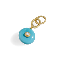 Load image into Gallery viewer, With its lovely robin's egg blue color, this beautiful turquoise from Arizona's famed Sleeping Beauty mine makes a timeless and versatile diamond studded charm. So, bring out a gold chain or silk or leather cord and wear it solo or mix with your favorite charms and pendants. Length approximately 39mm, width 10.7mm (L 1.5in W .4in).

Made from recycled 18k gold, a 12.25mm Sleeping Beauty turquoise rondelle (5.02ctw) and a Canadian diamond (.06ctw). The chain is available separately.