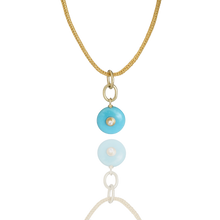 Load image into Gallery viewer, Cerula Charm #1 on a chain.