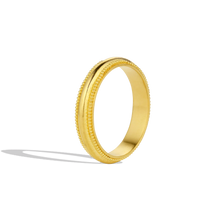 Load image into Gallery viewer, An elegant handmade domed band inspired by the oldest classical Greek order of architecture. Doric is the simplest order, noted for its simplicity, fluted curves and lack of decoration. Here, a line of granulation is placed either side of the domed silhouette to give additional form and volume - an unexpected decorative feature. Although ancient in style, the effect is clean and modern. Perfect for wearing alone or with your favorite stacking rings. Made in recycled 22k yellow gold. Size 6.5. Made to order.