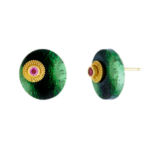 Load image into Gallery viewer, The beautiful vivid green and black roval tablet style cabochons in these stud earrings are grossular garnets from East Africa. Delicately granulated elliptical rondelles cradle hot pink spinel, asymmetrically set on each garnet, providing an unexpected yet harmonious blend of ancient technique and modern design. Made from recycled 18k and 22k yellow gold, grossular garnets (29.5ctw) and Burmese spinel (.34ctw).

One-of-a-kind.