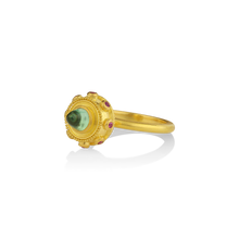 Load image into Gallery viewer, Side angle view, laying down, of the Green Orb ring.