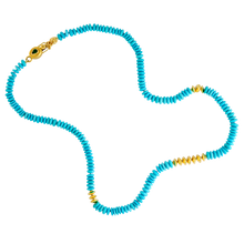 Load image into Gallery viewer, Robin's Egg blue Sleeping Beauty turquoise rondelles are spaced with Mesopotamian style gold disc beads. An oval granulated and emerald set clasp closes the strand. Length 18.5 inches.

Made from recycled 22k gold, Sleeping Beauty turquoise (96ctw) and Colombian emerald (.13ctw).