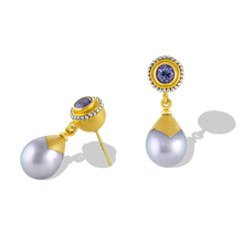 Load image into Gallery viewer, Hollow golden spheres edged with a ruff of platinum and gold granulation, set with lavender spinel are the perfect foil for silvery gray Tahitian Maki-e pearls. Length approximately 25.5mm W 9.6mm (L 1in W .4in).

Made in recycled 22k yellow gold and platinum, lavender spinel (.88ctw) and Tahitian maki-e pearls (9.6 x 12.2mm).

One-of-a-kind.