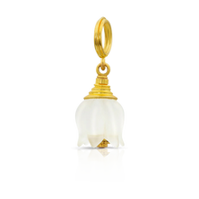 Load image into Gallery viewer, This delicate charm is hand carved from rock crystal in the shape of a Lily of the Valley flower and given an opaque, matte finish. A glittering deep hot pink spinel (.04ct) surrounded by golden granulation and set into the flower gives a pop of color.

Handmade in recycled 22k yellow gold and rock crystal (5.6ctw). Length approximately 26mm, W 10mm (L 1.02in W .4in).