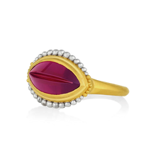 Load image into Gallery viewer, I love carved gemstones and few equal the genius of Tom Munsteiner, master gem cutter. Tom treats each gem as a treasure, creating miniature sculptures of color and light. This rhodolite garnet has an anticlastic curve to it, giving it a beautiful profile and some challenges to make! It is however a truly one-of-a-kind ring with our signature graduated granulation floating around the garnet (4.24ct).

Made in recycled 22k yellow gold and platinum and a Munsteiner garnet. Size 7.