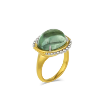 Load image into Gallery viewer, If green is your color, then this is your ring! This glorious sea green tourmaline (11.03ct) has depth and character and makes a splash on your hand. Our signature soft rich gold and polished silvery platinum graduated granulation gives this ring a timeless quality that makes it perfectly at home with jeans through to occasions. It's beautiful. One-of-a-kind.

Made in recycled 22k yellow gold and platinum and a Mozambiquan tourmaline. Size 7.