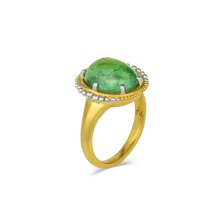Load image into Gallery viewer, The use of platinum along with gold in our signature graduated granulation floating orbit-like around the oval vivid gemmy "gummy bear" green tourmaline (6.23ct), brings a contemporary touch to this ring. If green is your color, this is your ring. It's gemmy, vivid and delicious. Perfect with your favorite fitted tee, crisp button down, cashmere sweater or occasion. One-of-a-kind.

Made in recycled 22k yellow gold and platinum and a Nigerian tourmaline. Size 7.