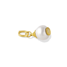 Load image into Gallery viewer, An unusual pagoda shaped white circlé South Sea Pearl is adorned top and bottom with the soft buttery tones of golden granulation and a pavé diamond sparkle. Wearing this pearl is fun, the pagoda shape makes it both casual and occasion wear and it's great layered with other favorite charms.&nbsp;A 20k gold clasp is included. Length approximately 39mm, width 16mm (L 1.5in W .6in).

Made from recycled 22k and 20k gold, responsibly sourced diamonds and a 16mm Paspaley South Sea pearl.