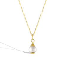 Load image into Gallery viewer, The Pagoda pearl shown on a gold chain.