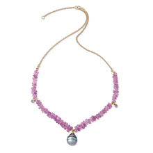 Load image into Gallery viewer, A striking one-of-a-kind chain composed of pastel pink sapphire briolettes accenting a rolo style chain. Soft lavender purple tanzanite stations and a silver pearl with pastel pink and blue overtones enhance the briolette's gentle graduation and evoke a delicate yet substantial necklace. Length 17 inches, adjustable to 19 inches.

Made with recycled 18k and 22k yellow gold, natural pink sapphire (40ct), tanzanite and a cultured 12.5x15.6mm Tahitian pearl. Strung on monofilament.