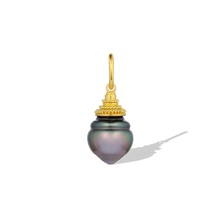 Load image into Gallery viewer, A one-of-a-kind, dainty metallic purple drop-shape circlé pearl. The pagoda style cap follows the circlé rings in the pearl, making the cap look like an extension of the pearl. Granulation gives volume and texture, enhancing the temple like feel. Wear every day, alone or nestled amongst your favorite chains and charms. Length approximately 23.8mm, width 9.9mm (L .9in W .4in).

Made from recycled 22k gold and a 9.9x11mm cultured Tahitian pearl. The chain is available separately.