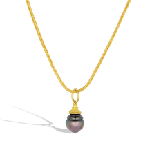 Load image into Gallery viewer, The Purple Circlé charm shown on a handmade woven gold chain.