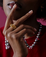 Load image into Gallery viewer, Model wearing the Fila Band and other rings.