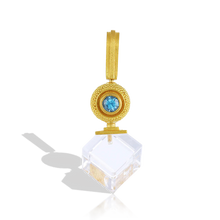 Load image into Gallery viewer, I love movement in jewelry, and this charm swivels around the bail, offering two separate looks, one with the blue zircon and the other with the gold granulated sphere facing outwards.  Rich, buttery high karat gold softens the bold, angular lines of the cube, seamlessly blending the ancient technique of granulation with modern design. Perfect for distinctive, not your usual everyday wear. Length approx. 37.5mm, W 16.5mm (L 1.4in W .6in). Made with recycled 22k yellow gold, Cambodian zircon (.48ctw).