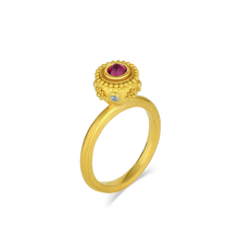 Load image into Gallery viewer, A reverse set mysterious deep purplish red rhodolite garnet (.33ct) centers this charming Sfaira ring with bright blue zircons (.09ct) and a ring of gold granulation orbiting around it around it. Wear as a single ring or create your own story by mixing with your favorite stacking bands or our other Sfaira and Orb rings.

Made in recycled 22k yellow gold, responsibly sourced rhodolite garnet (.33ctw) and blue zircon (.090ctw). Size 7. Can be resized. One-of-a-kind.