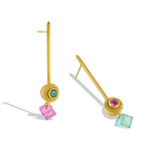 Load image into Gallery viewer, Spring is here in these beautiful golden spheres edged with a ruff of granulation, set with fresh, spring green tsavorite garnet and pink tourmaline. Long, elegant brushed golden sticks allow the spheres and cubes to swing gently from the ear, making these earrings unique and striking. Length approximately 44.7mm W 8.8mm (L 1.7in W .35in).

Made in recycled 22k yellow gold, Brazilian tourmaline (4.78ctw), Kenyan tsavorite garnet (.28ctw) and That spinel (.22ctw).