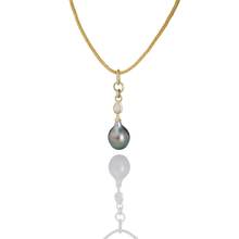Load image into Gallery viewer, The Moonstone Perfumer's Flask charm shown on a chain.