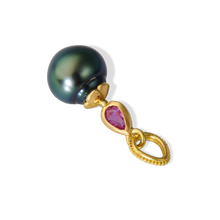 Load image into Gallery viewer, Angle view of the ruby Perfumer's Flask charm.