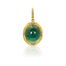 Load image into Gallery viewer, Inspired by both the original Etruscan and Castellani jewels, this oval green tourmaline is edged with our signature graduated gold and platinum granulation. A similarly granulated bail completes the charm.

Handmade using recycled 22k yellow gold and platinum and Brazilian tourmaline (7.4ctw). Length approximately 31mm, width 16mm (L 1.22in W .64in).

One-of-a-kind.