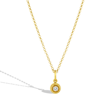 Load image into Gallery viewer, This charm has the silky appearance of a velvet cushion. The gold is smooth and almost soft to the touch, giving an almost hypnotic feel to the fingertips. The buttery tone of the gold is a perfect foil for the diamond sparkle. Although the technique of granulation is ancient, the effect is modern, yet distinct. A charm for everyday wear. The chain is available separately.

Handmade using recycled 22k gold and a reclaimed diamond (VS G .25ct).