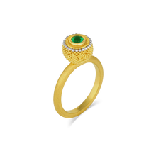 Load image into Gallery viewer, Inspired by the goldsmiths of antiquity, who used gold granules to paint scenes and tableaux on their work, this elegant and versatile ring has the silky appearance of a soft, rounded velvet cushion. The gold is smooth and almost soft to the touch, and a vivid emerald sparkle make it a perfect choice for frequent wear. A parchment like texture gives the ring band a soft parchment like feel.

Made in recycled 22k yellow gold and a Colombian emerald (.27ctw). Size 7. Can be resized.
