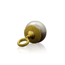Load image into Gallery viewer, Laying down view showing the spiral granulation on the cap.