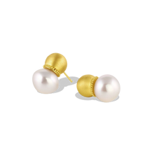 Load image into Gallery viewer, Hollow golden spheres edged with a delicate ruff of golden granulation and set with lustrous baroque South Sea pearls. The warm buttery tones of the yellow gold give an antique yet contemporary feel, a pearl aficionado's choice for everyday wear. These uniquely shaped and versatile earrings can be worn as ear climbers or as a drop, for climbers, simply turn the pearls downwards. Length approximately 22mm W 13mm (L .8in W .5in).

Made in recycled 22k yellow gold and 13mm Australian Paspaley South Sea pearls.